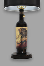 Wine bottle lamp made from a reclaimed Juggernaut Cabernet Sauvignon bottle, front view, on a gray background