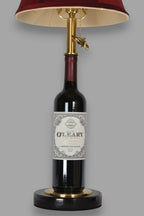 Wine bottle lamp made from a reclaimed 2014 O'Leary Cabernet Sauvignon bottle, front view, on a gray background